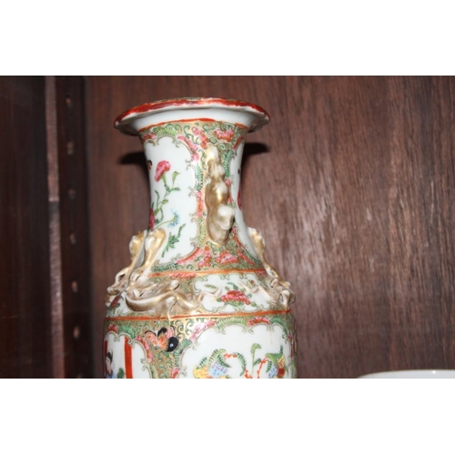 59 - A Canton enamel two-handled baluster vase with gilt decoration, 9 1/2