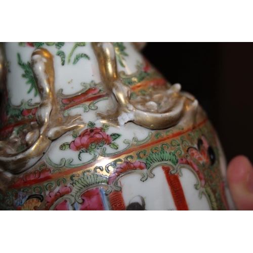 59 - A Canton enamel two-handled baluster vase with gilt decoration, 9 1/2