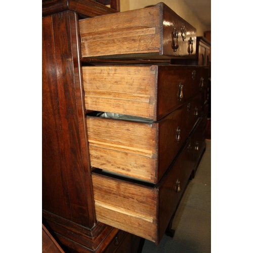 569 - An early 18th century burr walnut chest on stand, the upper section with two short and three long gr... 