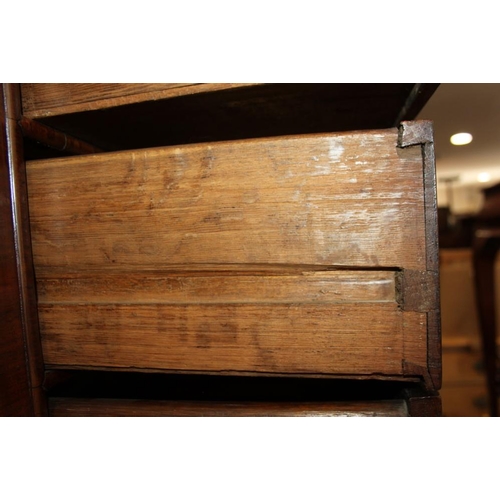 569 - An early 18th century burr walnut chest on stand, the upper section with two short and three long gr... 