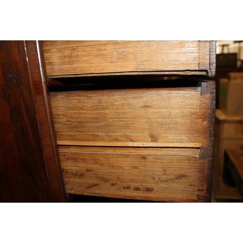 569 - An early 18th century burr walnut chest on stand, the upper section with two short and three long gr... 