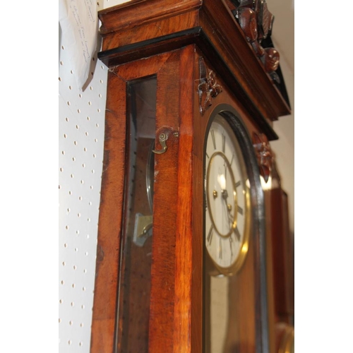 98 - A Vienna type regulator wall clock in figured walnut case, 48