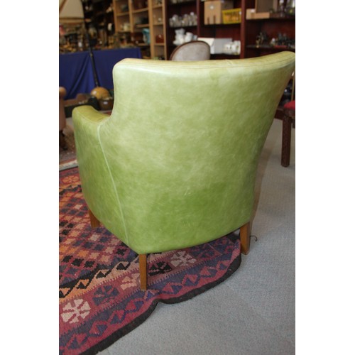 625 - **A retro 1960s design green leather tub armchair, on square taper supports (**Please note this lot ... 