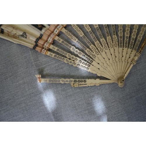 236 - A collection of late 19th century and later Continental fans with pasted decoration (damages)