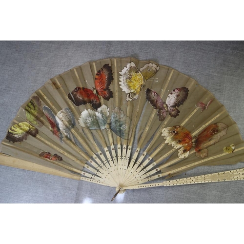 236 - A collection of late 19th century and later Continental fans with pasted decoration (damages)