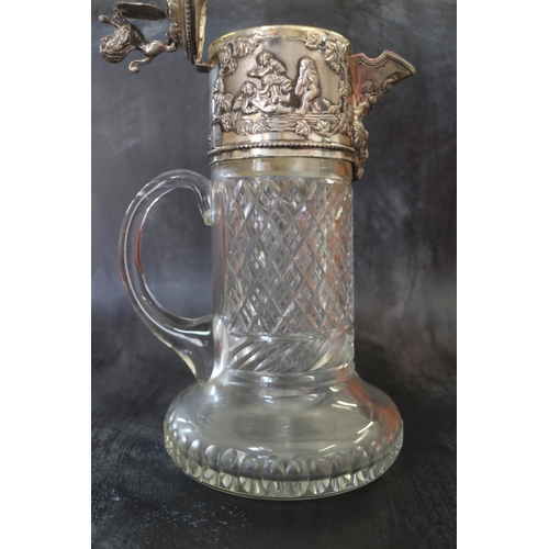 306 - A white metal mounted cut glass claret jug, stamped Topazio, 11