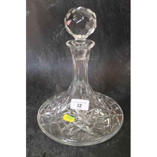 32 - Five glass decanters, a cut glass bowl, 9