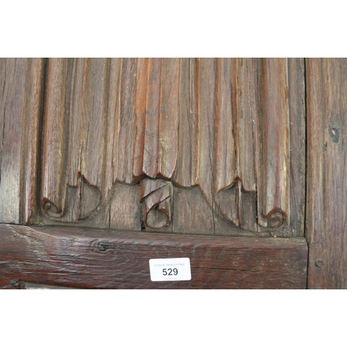 529 - A section of 16th century oak linen-fold panelling, now converted as a bed head, 44