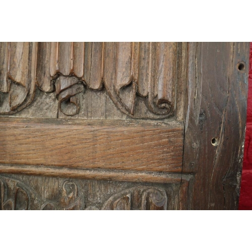 529 - A section of 16th century oak linen-fold panelling, now converted as a bed head, 44