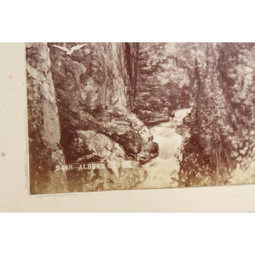 277 - An album of late 19th century black and white photographs views of Canada, inscribed 