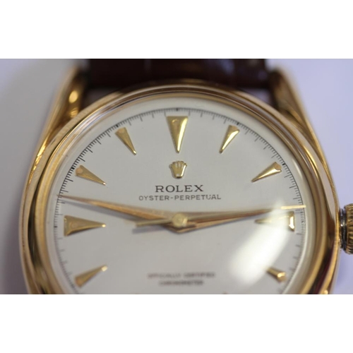 389 - A gentleman's 18ct gold cased Rolex Oyster Perpetual automatic wristwatch with white enamel dial and... 