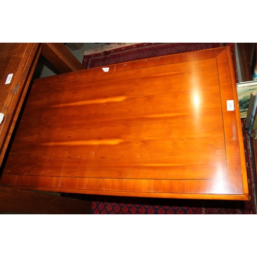 637 - A yew wood and banded coffee table, 40