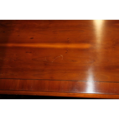 637 - A yew wood and banded coffee table, 40