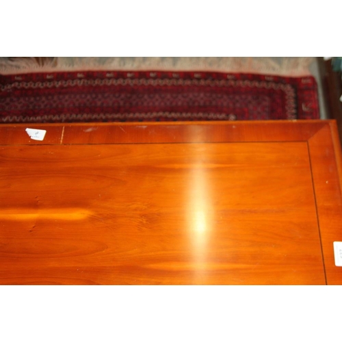 637 - A yew wood and banded coffee table, 40