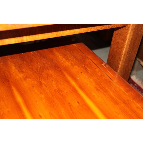 637 - A yew wood and banded coffee table, 40