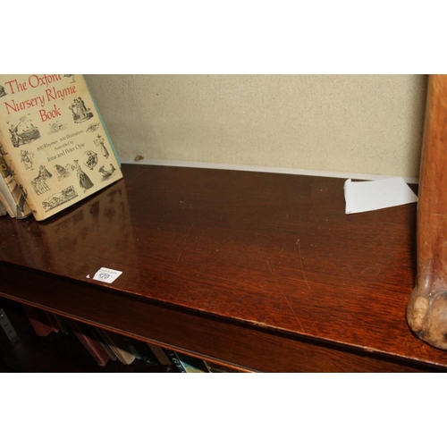 623 - An early 20th century mahogany low open bookcase, fitted adjustable shelves, on block base, 90