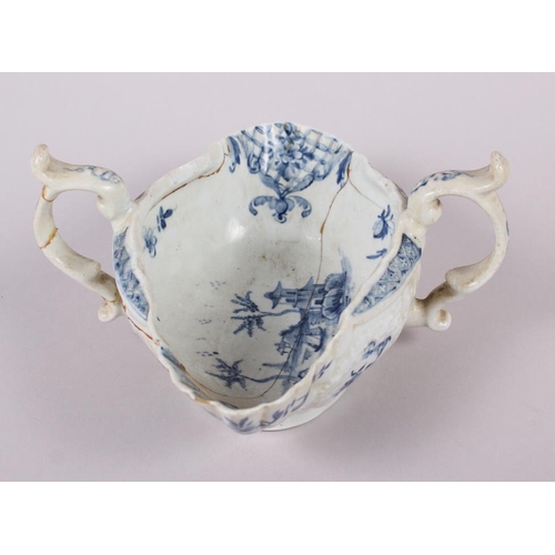 1 - An 18th century English blue and white porcelain two-handle sauce boat (heavily restored)