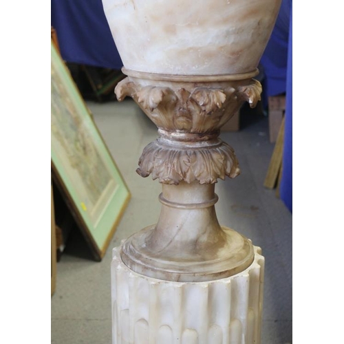 103 - A 19th century Italian sectional carved alabaster vase, on fluted base, 50