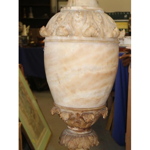 103 - A 19th century Italian sectional carved alabaster vase, on fluted base, 50