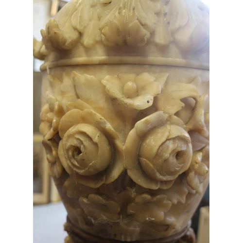 103 - A 19th century Italian sectional carved alabaster vase, on fluted base, 50