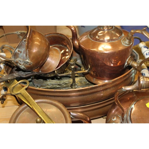 119 - A 19th century copper kettle, a brass cream skimmer, a brass kettle stand and other metalwares