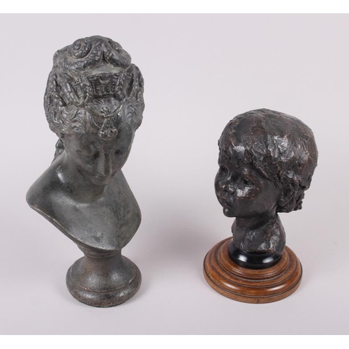 124 - K Carter: a bronzed bust of a young child, signed, marked 11:20, on oak stand, 8 3/4