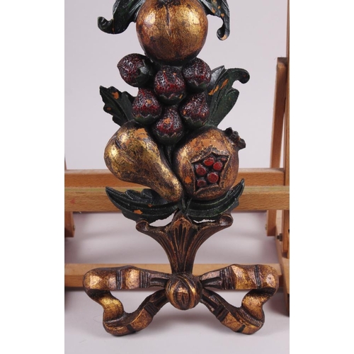 140 - A carved wood cornucopia with fruit and ribbon, 19