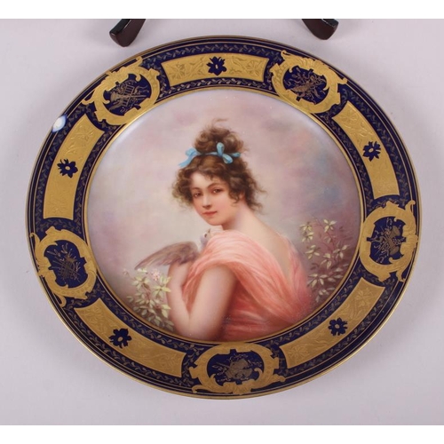 16 - A Vienna porcelain cabinet plate, decorated a maiden with flowers, signed Dedrich?, 9 1/2