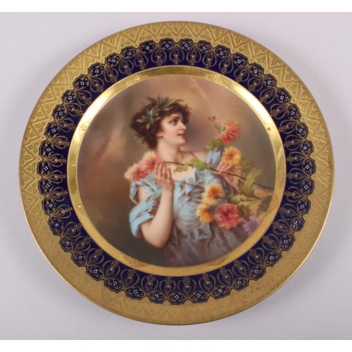 16 - A Vienna porcelain cabinet plate, decorated a maiden with flowers, signed Dedrich?, 9 1/2