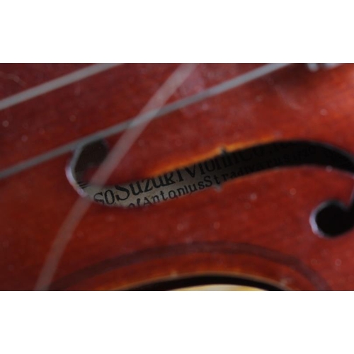 182 - A 1970s 1/16 violin, by The Kiso Suzuki Violin company Ltd, with bow, in case COLLECT