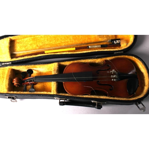 182 - A 1970s 1/16 violin, by The Kiso Suzuki Violin company Ltd, with bow, in case COLLECT