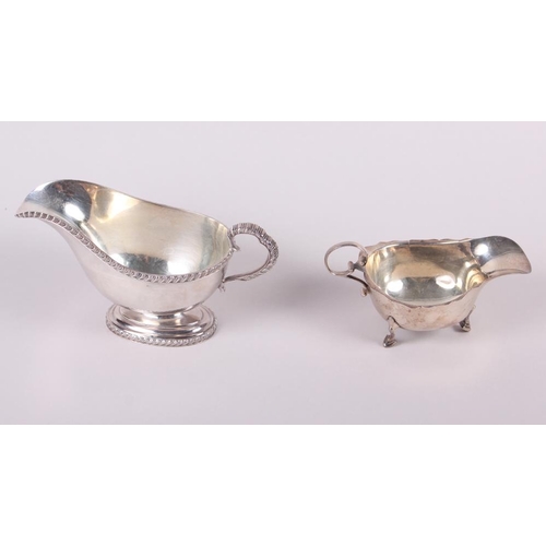 249 - A silver pedestal sauce boat with gadrooned border and a smaller silver sauce boat, 12.3oz troy appr... 