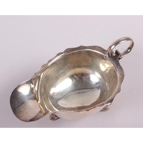 249 - A silver pedestal sauce boat with gadrooned border and a smaller silver sauce boat, 12.3oz troy appr... 