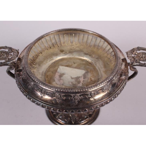 260 - A silver pedestal dish with two cast handles and embossed decoration, 17.1oz troy approx