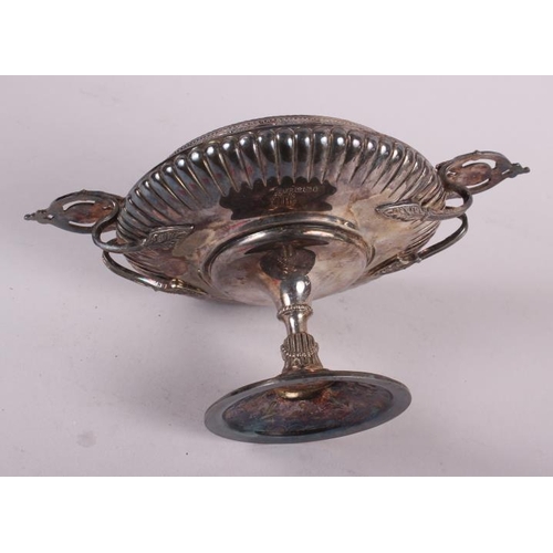 260 - A silver pedestal dish with two cast handles and embossed decoration, 17.1oz troy approx