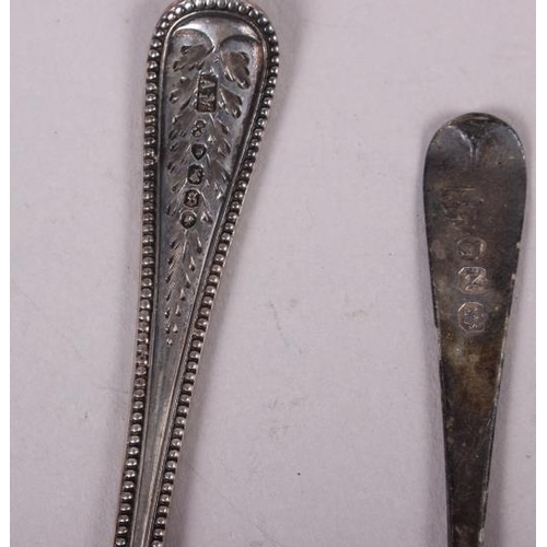 269 - A pair of silver fruit servers with pierced and engraved decoration and two silver spoons, 5.9oz tro... 