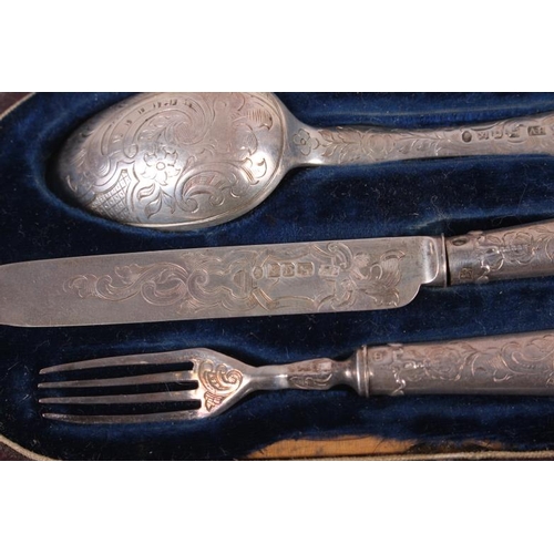 272 - A silver three-piece christening set with engraved decoration, in fitted case