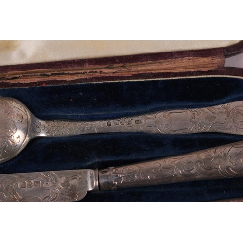 272 - A silver three-piece christening set with engraved decoration, in fitted case