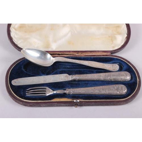 272 - A silver three-piece christening set with engraved decoration, in fitted case