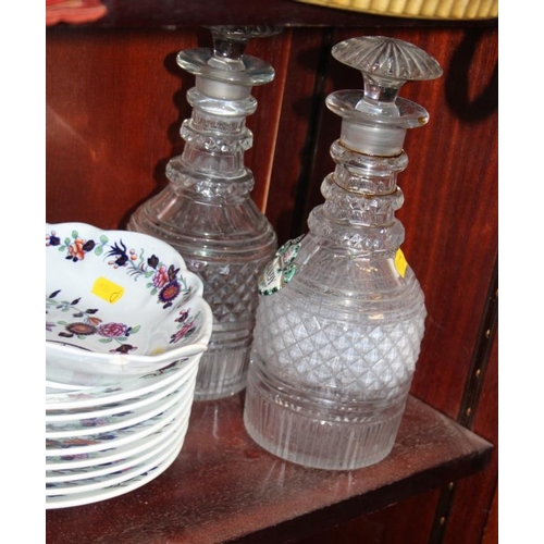 35 - A pair of Georgian cut glass decanters and stoppers, a Spode pottery part fruit set with floral deco... 