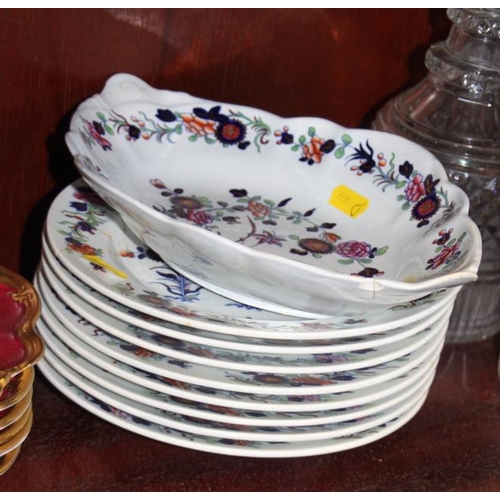 35 - A pair of Georgian cut glass decanters and stoppers, a Spode pottery part fruit set with floral deco... 