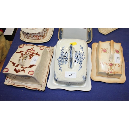 43 - A chintzware cheese dish and cover, and six other cheese dishes and covers