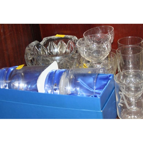 44 - An etched glass ice bucket, vases, whisky tumblers, ashtrays and other glassware