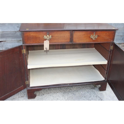 456 - A 19th century mahogany side cupboard, fitted two drawers over two doors, on bracket feet, 47