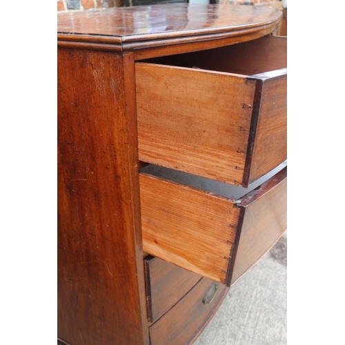 477 - A Victorian mahogany bowfront chest of two short and three long graduated drawers, on splay bracket ... 