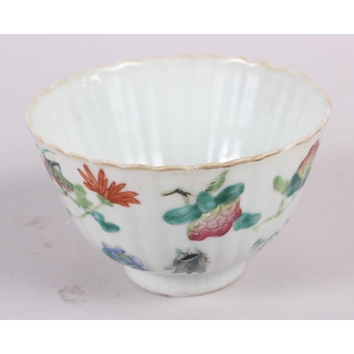 56 - Three Chinese famille rose tea bowls