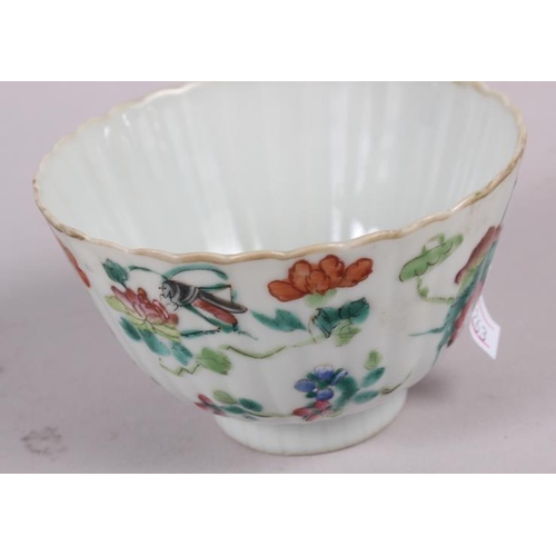 56 - Three Chinese famille rose tea bowls