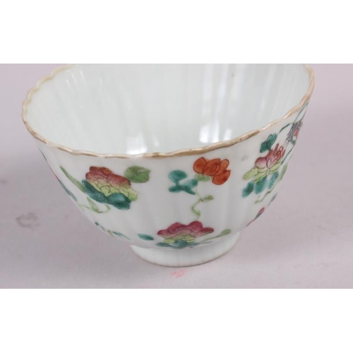 56 - Three Chinese famille rose tea bowls