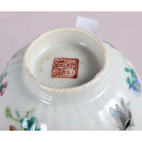 56 - Three Chinese famille rose tea bowls