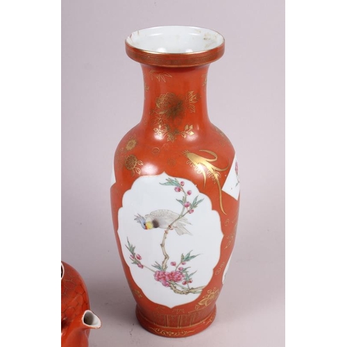 60 - A Chinese baluster vase, decorated panels of birds and flowers, 11 3/4